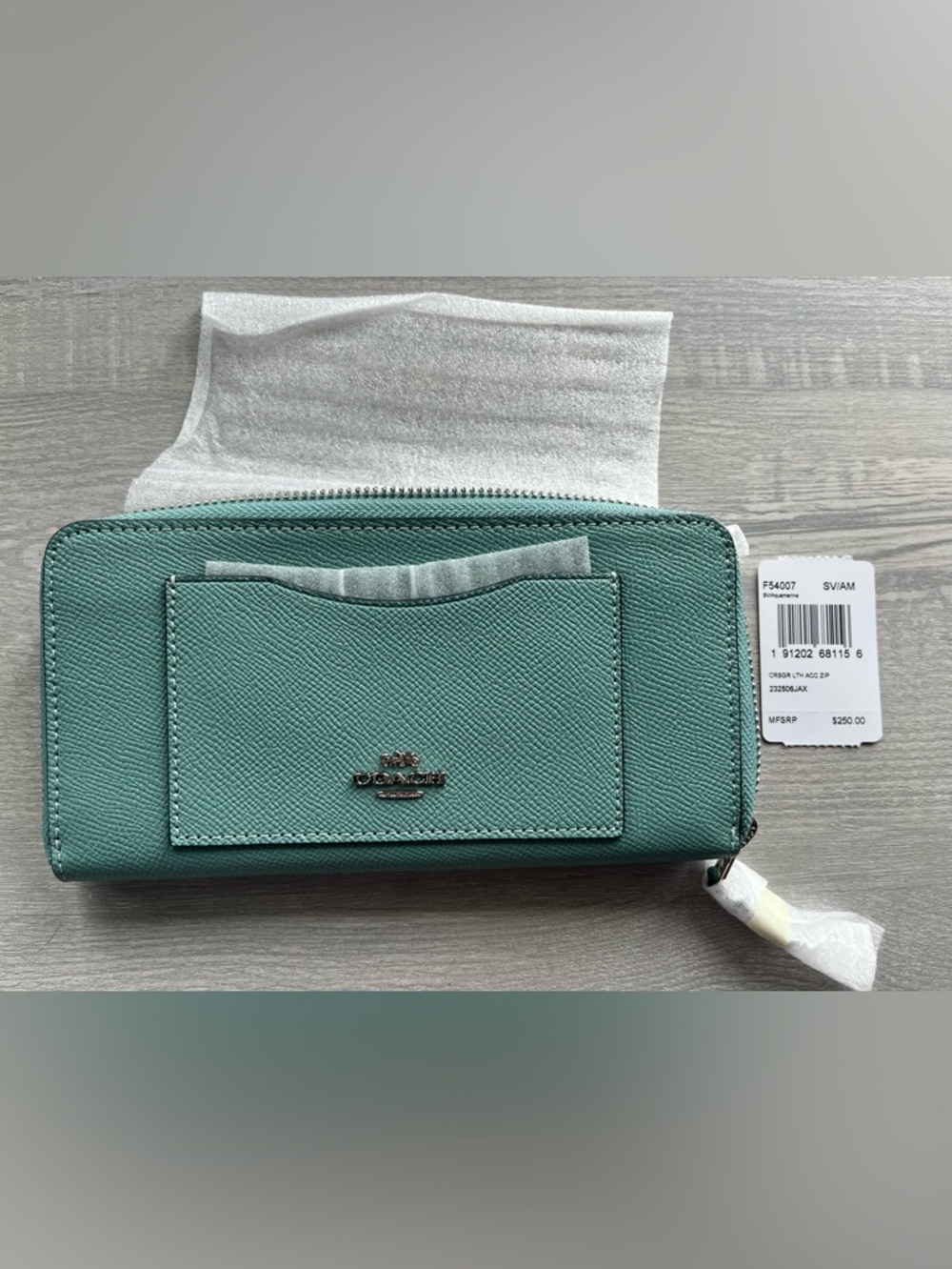 Coach Pebbled Zip-Around Wallet in Aquamarine